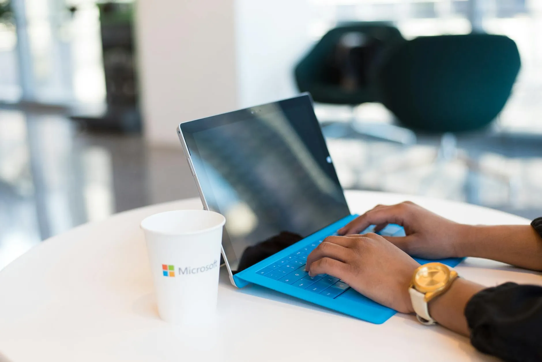 Close up of a student workspace with a laptop and study notes
