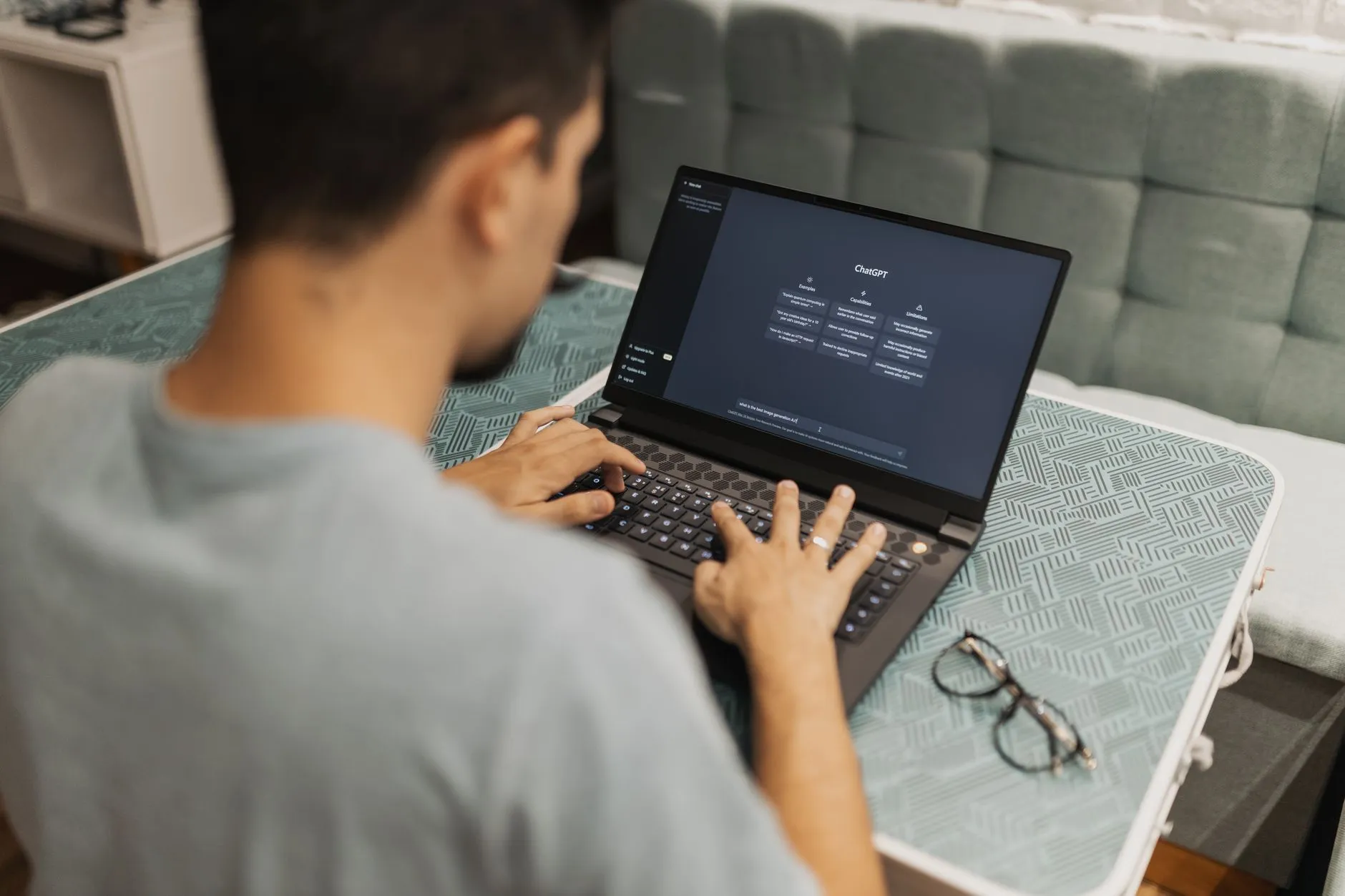 Student desk setup with laptop displaying structured lecture notes