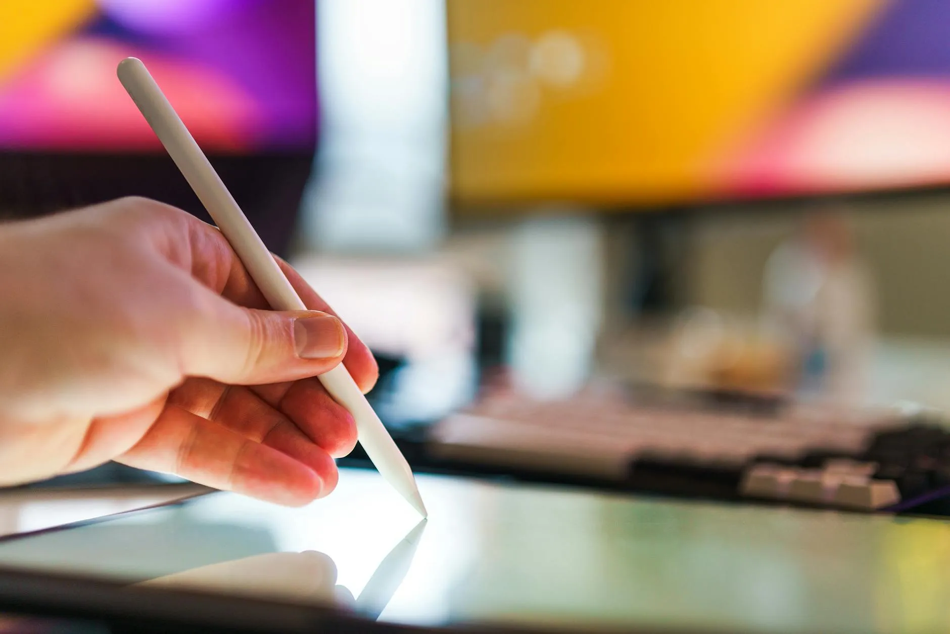 A student using a tablet to play a memorization game on a desk with coffee and notebooks
