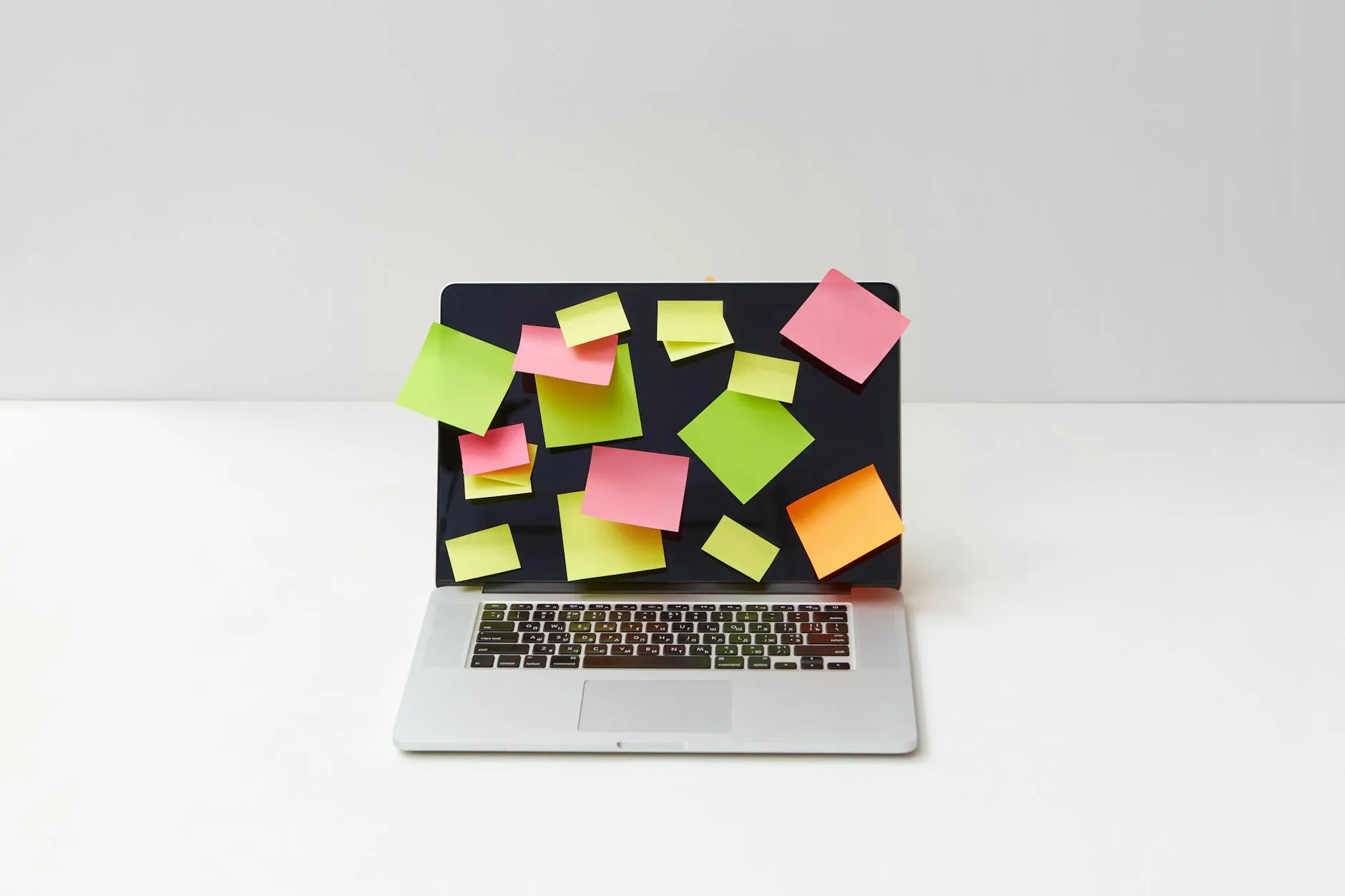 A comparison of a messy student desk with scattered papers and a tablet displaying organized digital notes.